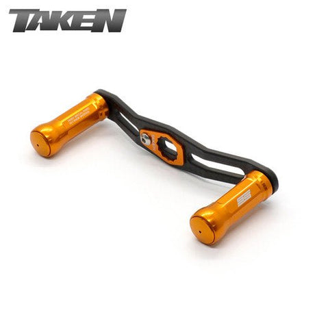 Abgebildet ist ein orangefarbener Taken SS Carbon Handle 85 mm von Taken mit SS Aluminiumknöpfen für Shimano & Daiwa. In der oberen linken Ecke steht "TAKEN".