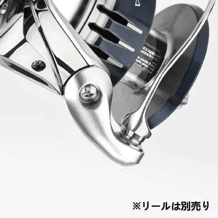 Nahaufnahme eines metallischen Gomexus Schnurlaufröllchens für Shimano SW Angelrollen mit glatter, reflektierender Oberfläche. Ein japanischer Hinweis unten rechts weist darauf hin, dass dieses Gomexus-Produkt separat erhältlich ist.
