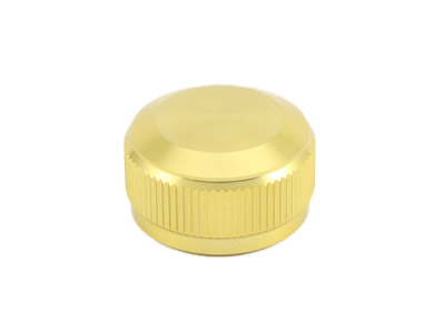 Die goldene Avail Aluminum Spool Tension Knob Cap für 19 SLX MGL, 20 SLX DC und 21 SLX BFS Rollen ist auf weißem Hintergrund abgebildet und weist ein rundes Metalldesign mit geripptem Rand auf.