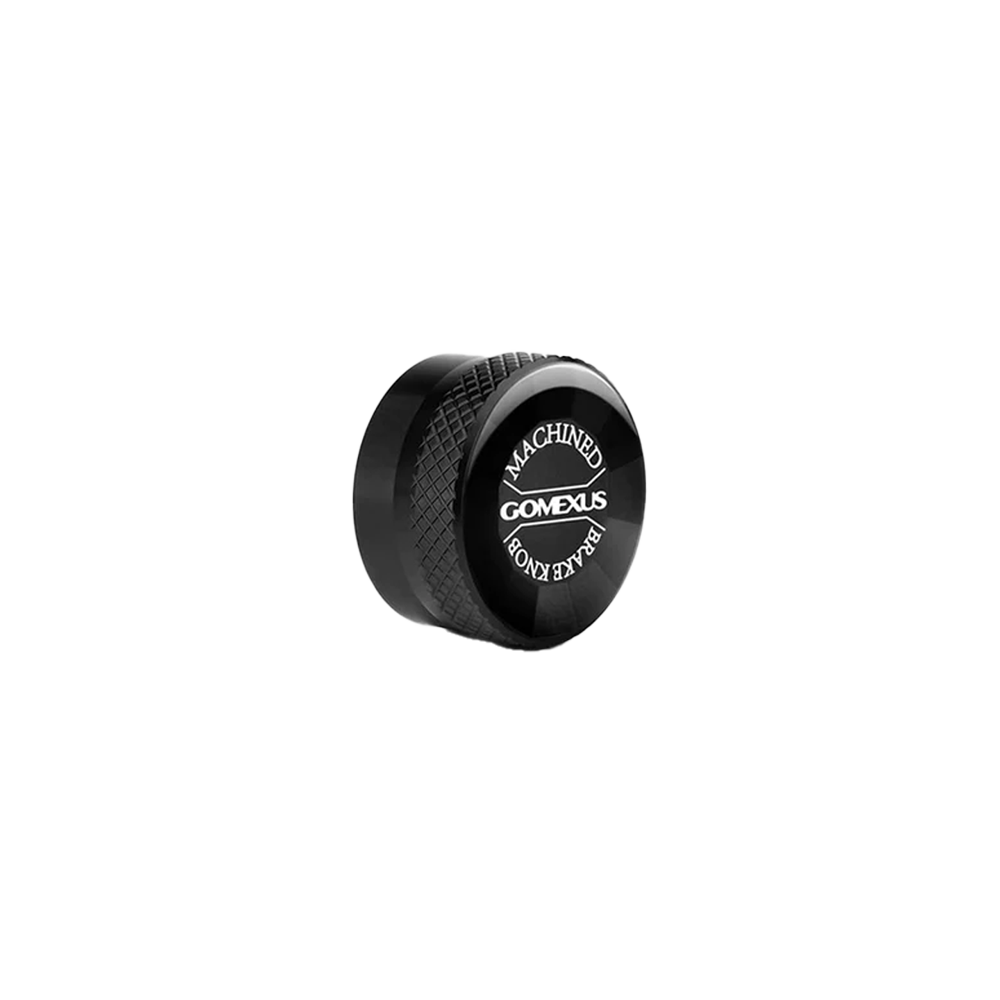 Eine schwarze, runde Gomexus Aluminium-Spulenspannungsknopfkappe mit strukturiertem Griff und weißer Beschriftung ist perfekt für Ihre Spulenbremsenkappen und passt ideal zu jedem Gomexus-Baitcasterrollen-Setup.