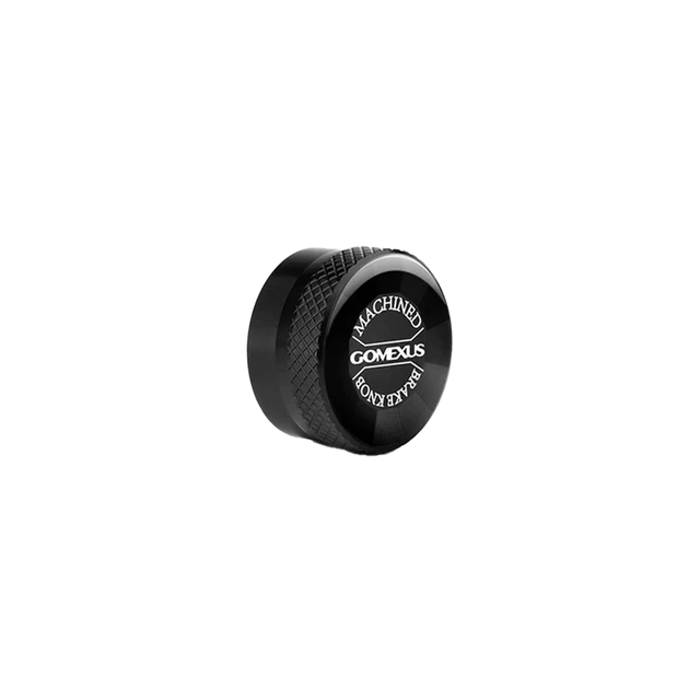 Eine schwarze, runde Gomexus Aluminium-Spulenspannungsknopfkappe mit strukturiertem Griff und weißer Beschriftung ist perfekt für Ihre Spulenbremsenkappen und passt ideal zu jedem Gomexus-Baitcasterrollen-Setup.