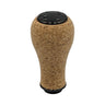 Der SLP Works Power Light Cork Knob S von SLP Works besteht aus einem Korkkörper und einer schwarzen (Schwarz) Oberseite, die auf einem schlichten weißen Hintergrund abgebildet ist.