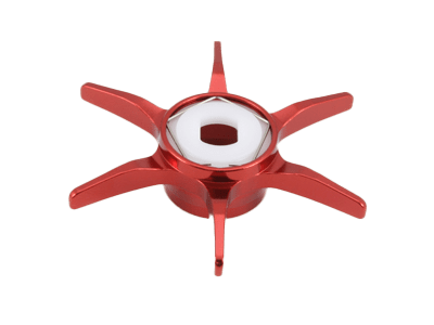 Eine rote, sechsspeichige Avail Hexagonal Sternbremse für Shimano, mit einem weißen sechseckigen Zentrum, von oben gesehen vor einem schlichten weißen Hintergrund.