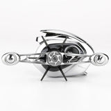 Nahaufnahme der Gomexus Sternbremse 60 mm auf einer Shimano Antares 19 Rolle. Sie besticht durch ihr glänzendes Silber-Finish mit schwarzen Akzenten. Der horizontale Griff hebt die sternförmige Gomexus Sternbremse von Gomexus hervor, die vor einem schlichten weißen Hintergrund zu sehen ist.