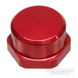 Auf weißem Untergrund ist eine rote, sechseckige Hedgehog Studio Shimano Griff-Kontermutter M7 für originale Shimano Kurbeln mit glatter, flacher Oberseite abgebildet. In der unteren rechten Ecke steht „HEDGEHOG STUDIO“.