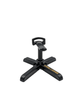 Der RL-Angelrollentuning Röllenständer DK ist ein schwarzer Kunststoffständer mit breiter kreuzförmiger Basis, einer zentralen vertikalen Stütze mit einem Griff an der Oberseite und dem gelben Aufdruck „DOMINATOR“ auf einem Basisarm.