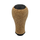 Der SLP Works Power Light Cork Knob S von SLP Works besteht aus einem Korkkörper und einer schwarzen (Schwarz) Oberseite, die auf einem schlichten weißen Hintergrund abgebildet ist.