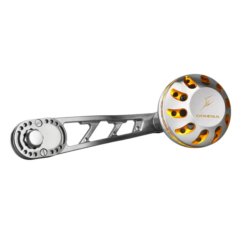 Der Gomexus Aluminiumgriff 85 mm verfügt über einen 38 mm Power Knob (7 x 4 mm) mit durchbrochenem Design, metallischem Silber- und Gold-Finish, Gomexus-Logo und eingravierter Fischillustration.